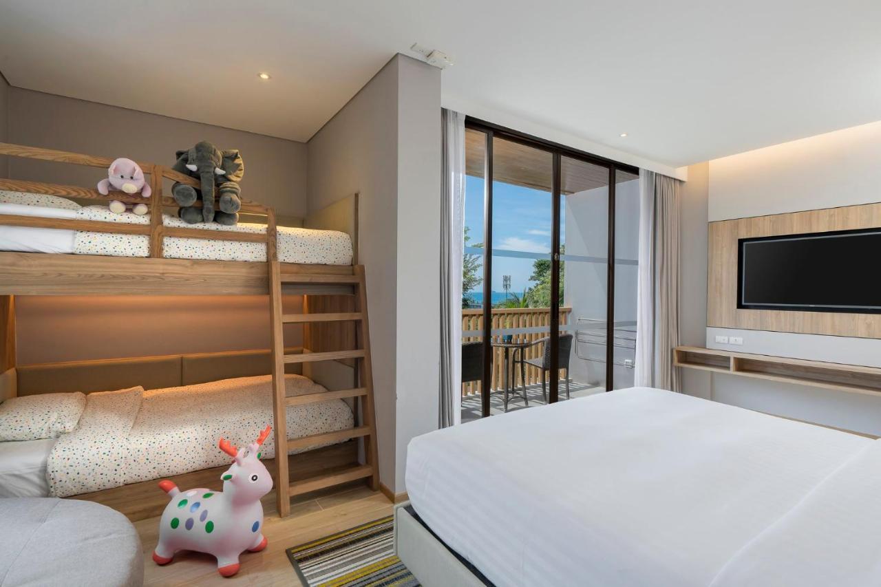 Habitación familiar con balcón al mar, 1 cama extragrande y 1 litera